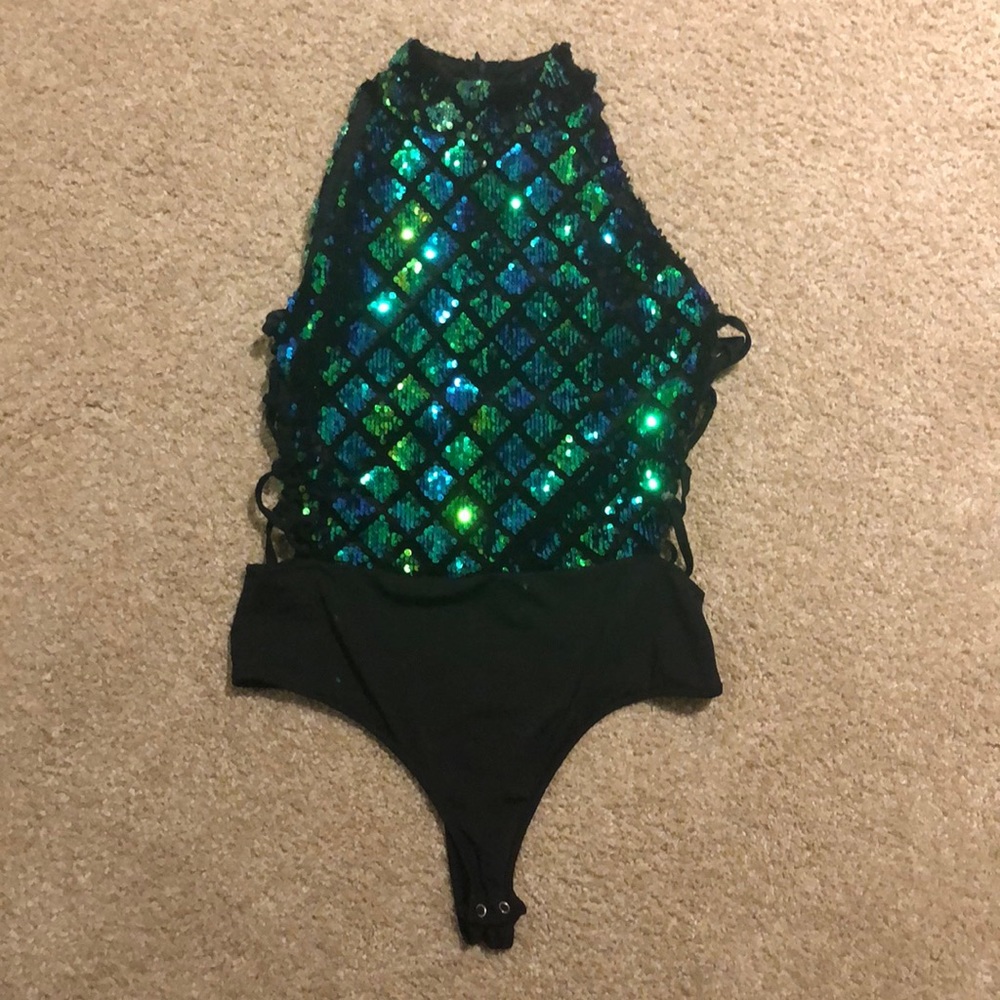 High-necked sequined bodysuit, with laced up sides.
